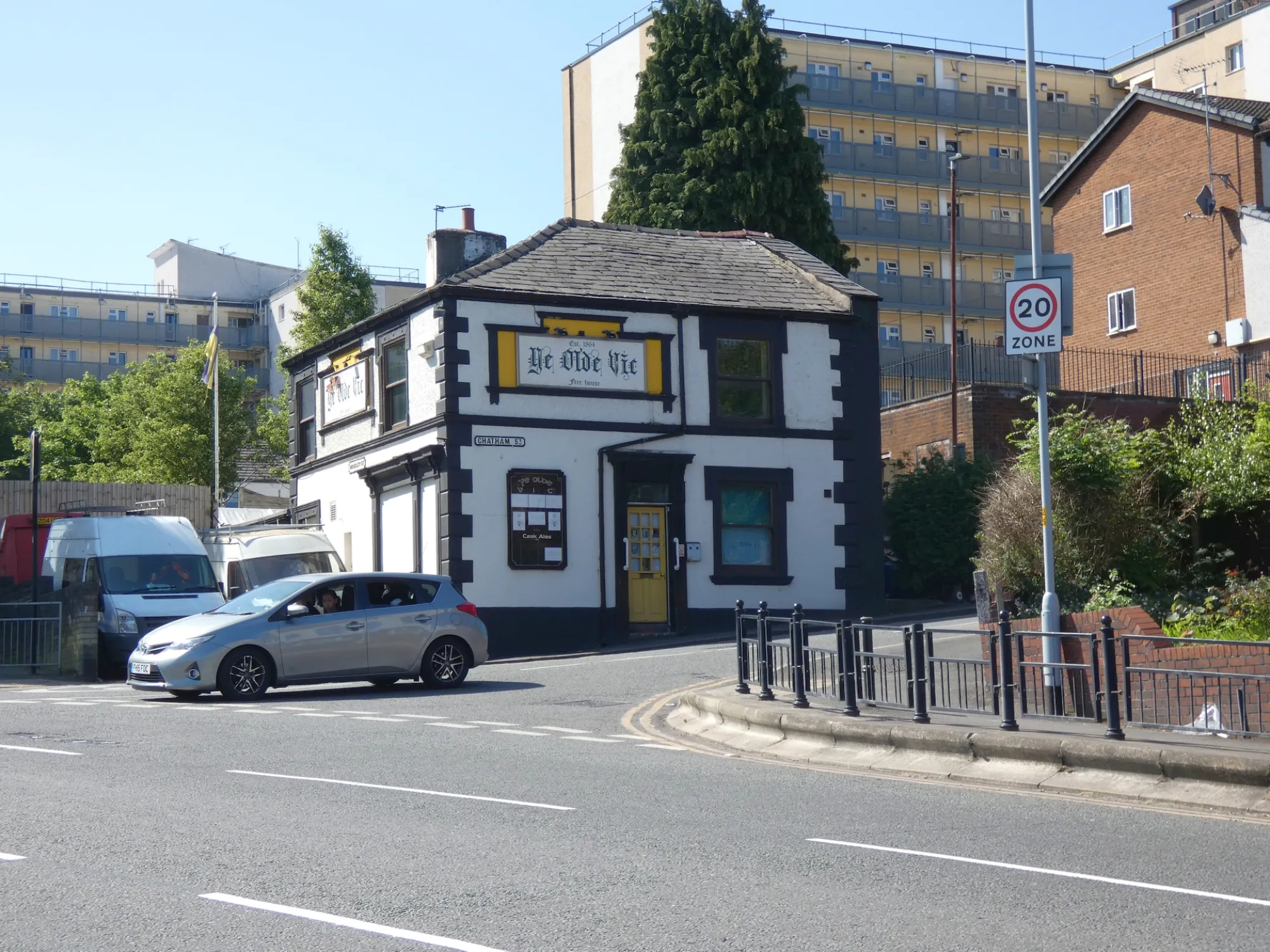 The black and white corner pub on Chatham Street with its Ye Olde Vic sign above the yellow door, a pub in Stockport