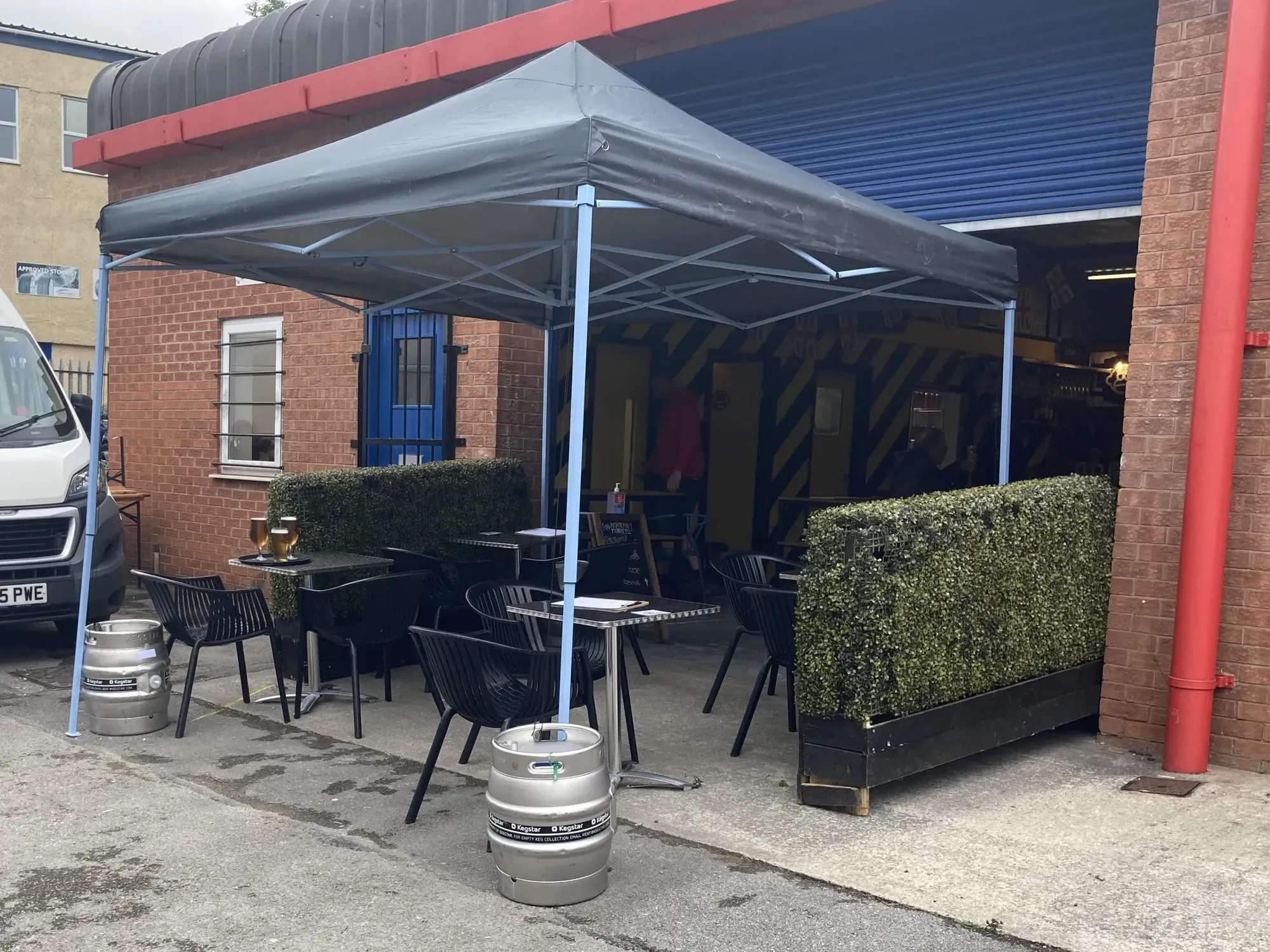 The outdoor seating at the entrance to Northern Monkey Brew Co taproom, a brewery tap in Bolton
