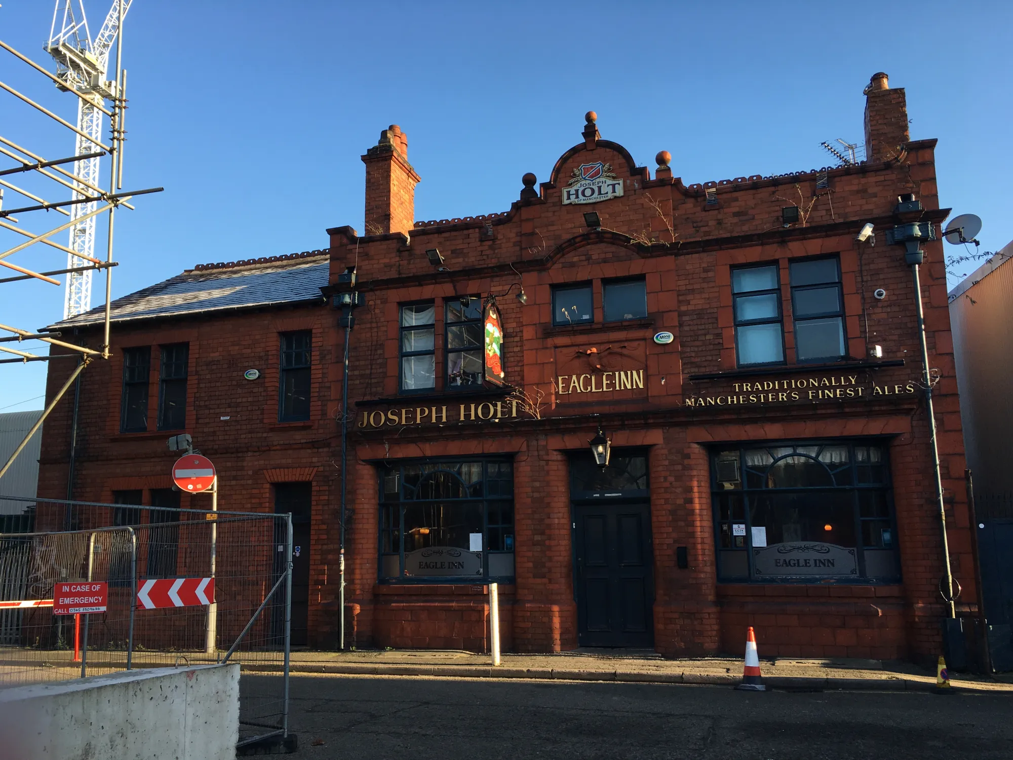 The red brick Joseph Holt front of the Eagle Inn on Collier Street, Salford, a pub in Salford